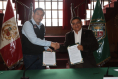 firma convenio con QAM YANAPANKI